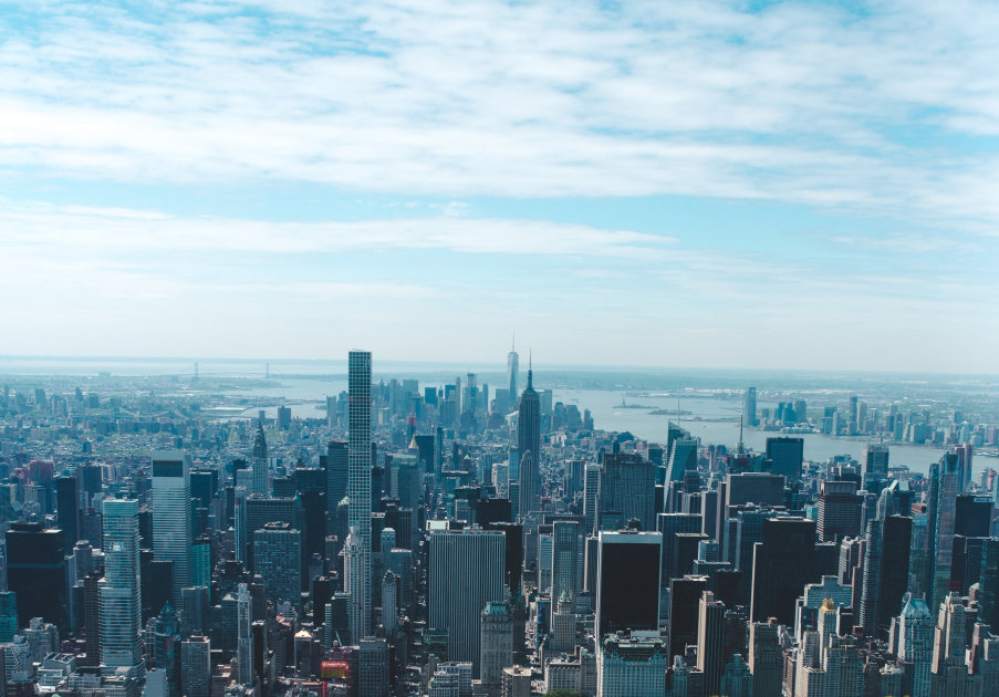 Manhattan skyline and beyond with a lot of tall buildings. See Key New York City Building Information On NYCity Map.