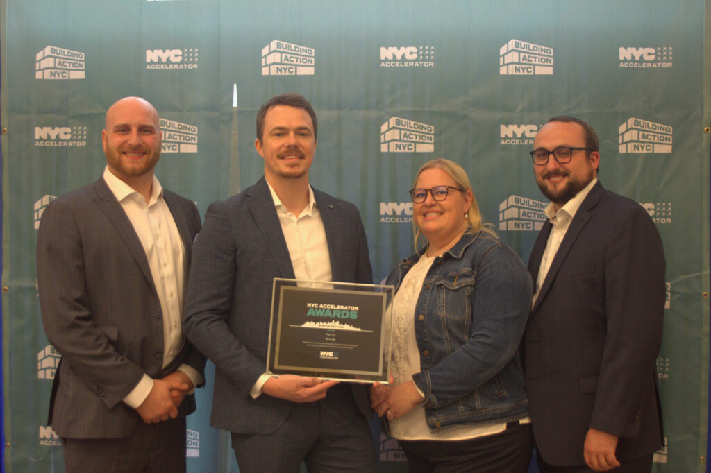 Rob, Brad, Lea, and Mark celebrating winning the NYC Accelerator Service Leader Award. Parity is a ClimateTech company.