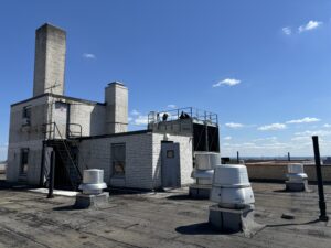 Exhaust fans and cooling tower on a roof in New York City