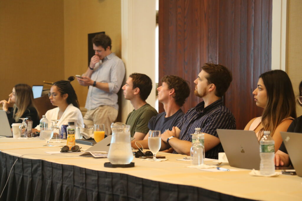 Members of the Parity team listening to a presentation